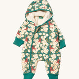 Little Green Radicals sherpa line snow suit in hedgerow. A GOTS organic cotton winter all in one outfit with a cute squirrel print with white flowers. Features a sherpa lined inner for warmth and popper fasteners. 