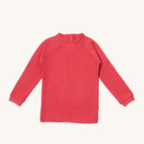 Little Green Radicals pink berry waffle long sleeve cosy top available at Babipur. A GOTS organic cotton top in dark pink, features popper fasteners on the back
