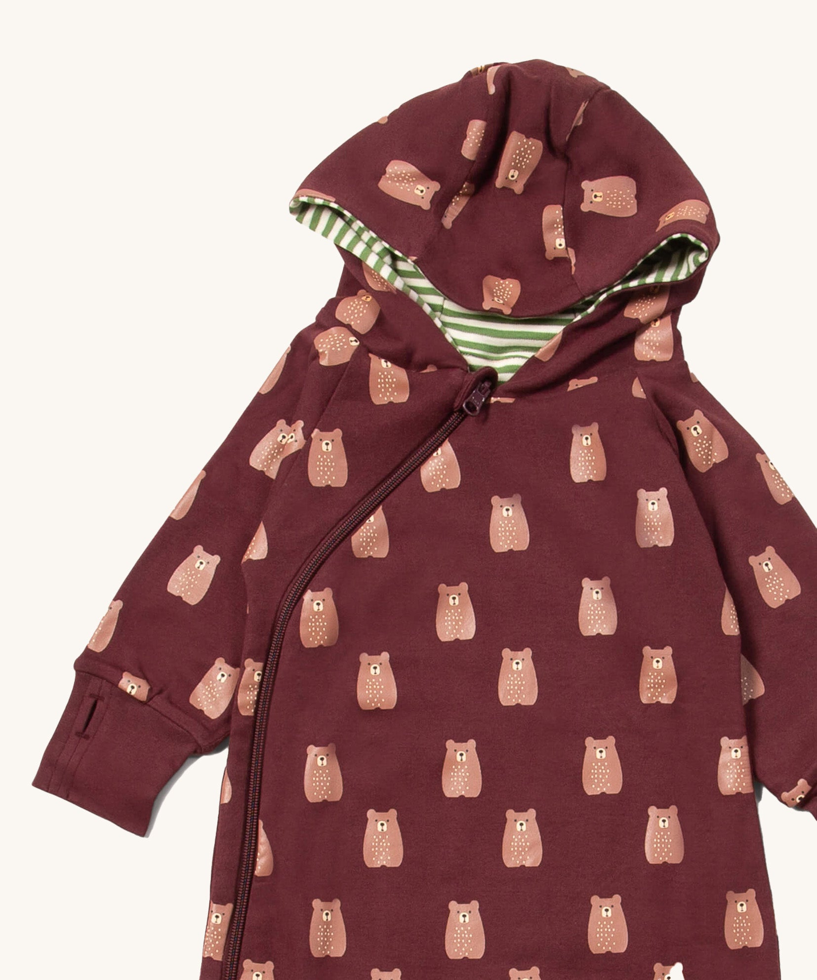 A close up of the Little Green Radicals hooded snug suit in brown bears showing the hood which has a green and white stripe inner and the zip detail on GOTS organic cotton fabric