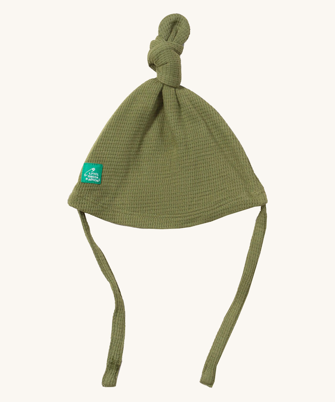 Little Green Radicals chive tie hat available at Babipur. A GOTS organic cotton hat in green with a knot on the top. Features a small brand patch on the brim and matching green ties for a secure fit.