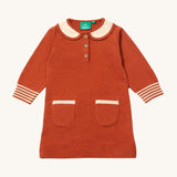 Little Green Radicals ginger knitted collar dress available at Babipur.. A GOTS organic cotton soft knitted dress in dark orange and cream trim. Features button fasteners on the top and 2 small side pouch pockets.