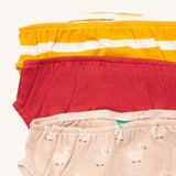 A close up of the Little Green Radicals puddle ducks underwear. Showing the trim detail and and a close up of each print and design on organic cotton fabric.