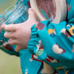  this beautiful jacket is windproof and waterproof. The coat is a beautiful teal green