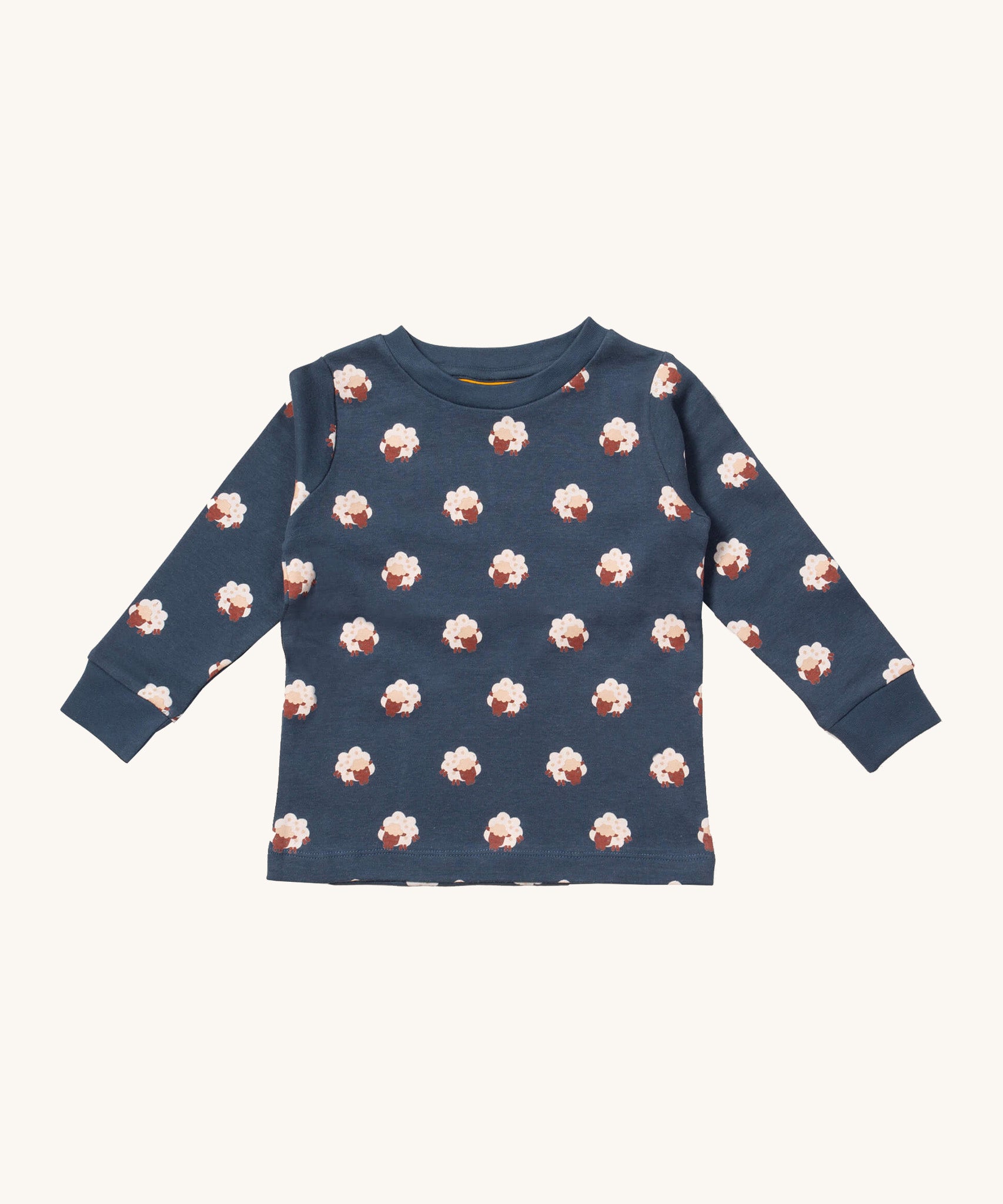 Little Green Radicals sleeping sheep pyjama top. A GOTS organic cotton top in navy with a matching collar trim and prints of cute white sheep