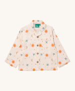 Little Green Radicals classic pyjama top from the moon and sun classic set. A GOTS organic cotton pyjama top in a classic shirt type style in light pink with prints of  a moon and sun with birds flying. Features button fasteners and a small chest pocket.