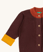 A close up of the Little Green Radicals knitted cardigan in chocolate showing the button detail and a close up collar and cuff detail on brown  GOTS organic cotton fabric and available at Babipur.