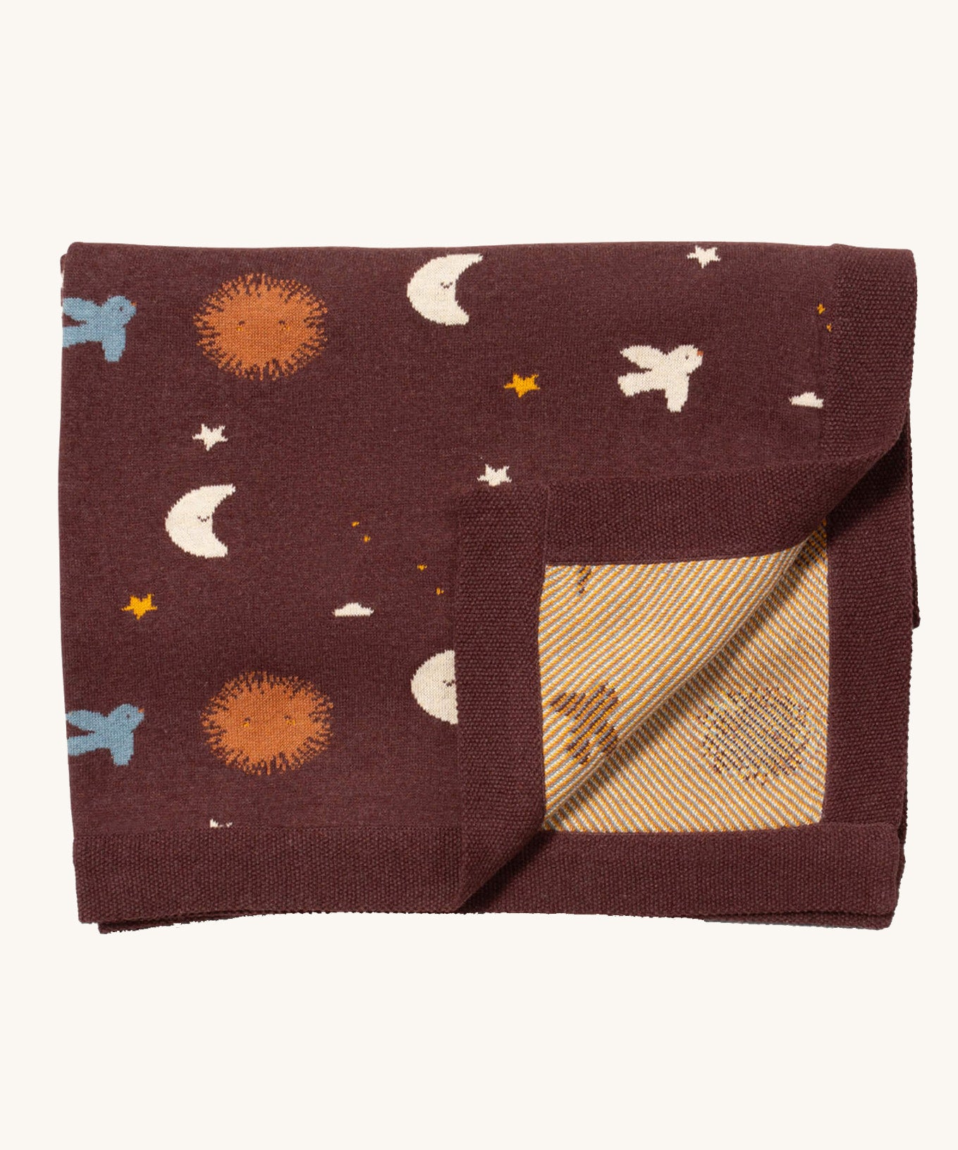 Little Green Radicals baby blanket in flying birds. A GOTS organic cotton blanket in brown with cute birds flying around the stars, the moon and the sun. Features a matching textured brown border and a yellow striped textured inner.