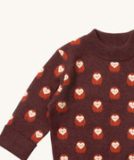 A close up of the  Little Green Radicals brown owl knitted jumper available at Babipur. Showing the owl detail and the thick collar on brown organic cotton fabric