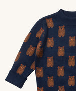A close up of the Little Green Radicals navy teddy bears knitted jumper showing the collar and cuff detail on navy organic cotton fabric. 