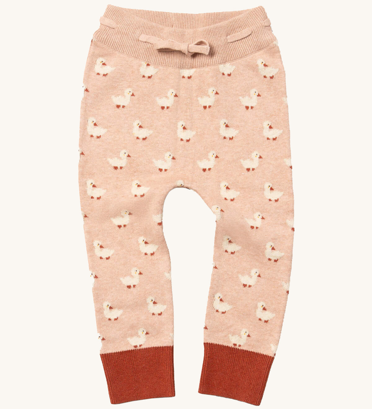 Little Green Radicals puddle ducks knitted leggings available at Babipur.. A soft GOTS knitted style leggings in light pink with red trim. Features an elasticated band with drawstring and cute duck knitted prints