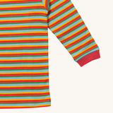 A close up of the Little Green Radicals autumn rainbow striped long sleeve top that's available at Babipur. Showing the red cuff detail on striped organic cotton fabric.