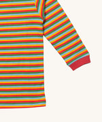 A close up of the Little Green Radicals autumn rainbow striped long sleeve top that's available at Babipur. Showing the red cuff detail on striped organic cotton fabric.