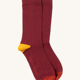 Little Green Radicals dark maroon block ankle socks from the golden leaves set available at Babipur. A GOTS organic cotton sock with yellow and red trim with brand name on the sole.
