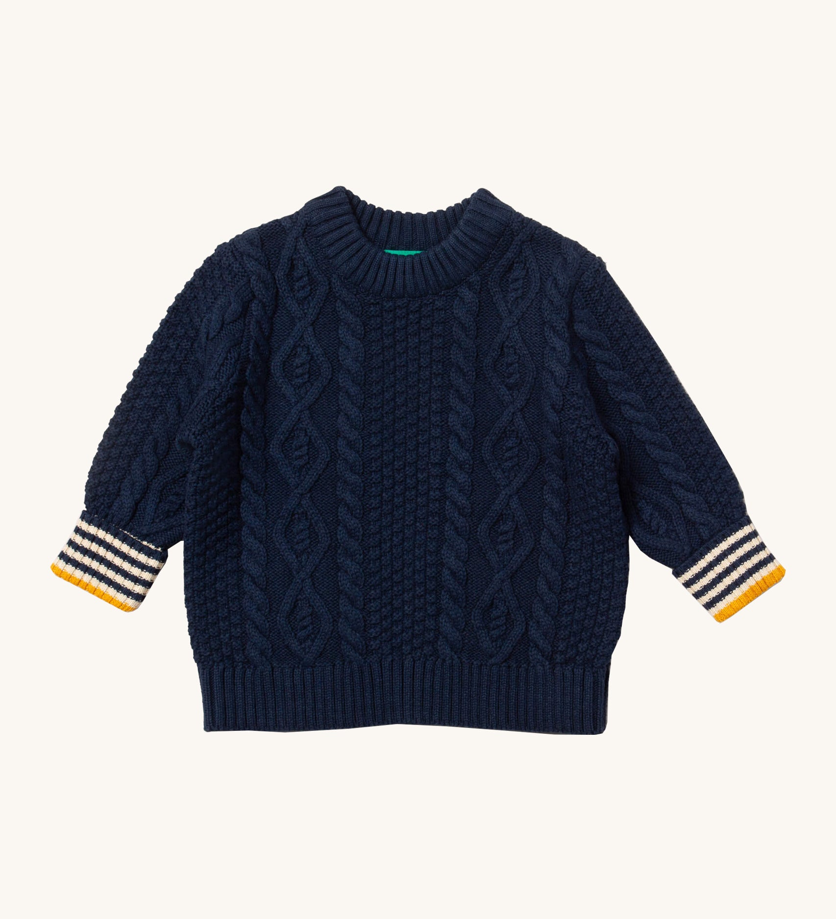 Little Green Radicals navy aran knitted jumper available at Babipur. A GOTS organic cotton jumper in dark navy with a thick cable knit on the body and a striped design on the cuffs.