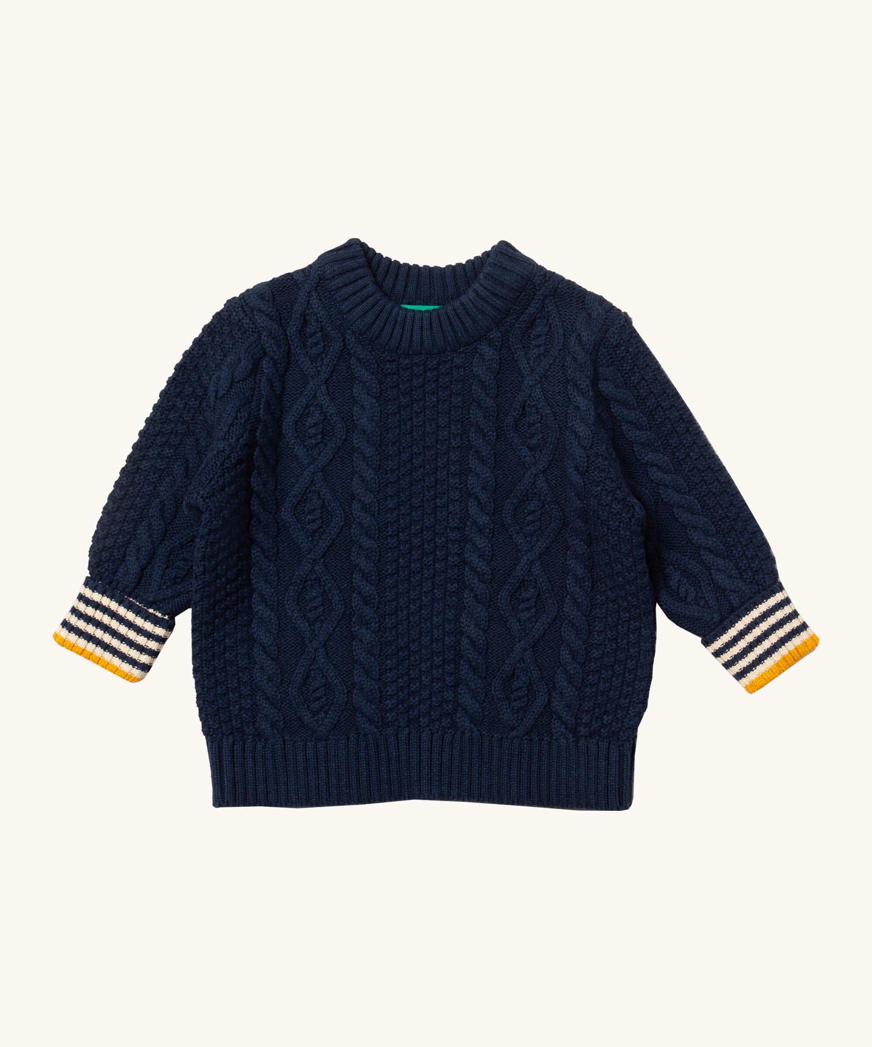 Little Green Radicals navy aran knitted jumper available at Babipur. A GOTS organic cotton jumper in dark navy with a thick cable knit on the body and a striped design on the cuffs.