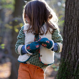 A child wearing the Little Green Radicals snuggly knitted jumper in olive stripe with a reversible sherpa fleece fox gilet on top making a warm outfit