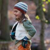 A child wearing the Little Green Radicals snuggly knitted jumper in olive stripe  with a reversible sherpa fleece fox gilet on top making a warm outfit available at Babipur.