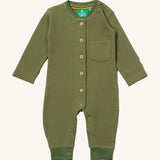 Little Green Radicals green chive waffle playsuit available at Babipur. A GOTS organic cotton all in one in a waffle knit style. Features button fasteners on the front and poppers around the crotch with a small pouch chest pocket