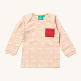 A close up of the Little Green Radicals puddle ducks sleeve t-shirt. Showing the elasticated cuff detail and red pouch pocket detail on peach organic cotton fabric