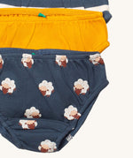 A close up of the Little Green Radicals sleeping sheep underwear 3 pack. Showing the trim detail and and a close up of the prints of sheep on organic cotton fabric