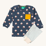 Little Green Radicals sleeping sheep playset available at Babipur. Features a GOTS organic cotton long sleeve t-shirt in navy with prints of cute sheep with a yellow chest pocket and a striped jogger in light blue and cream.