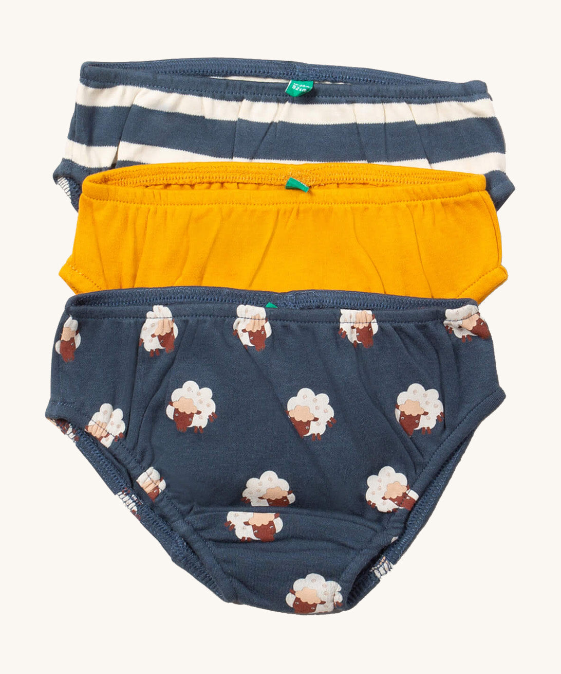 Little Green Radicals sleeping sheep underwear available at Babipur. A GOTS organic cotton underwear multipack, features a blue and white stripe, a yellow coloured and navy coloured underwear with prints of sheep.