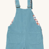 A close up of the Little Green Radicals pale blue lined corduroy dungarees. Showing the back pocket detail on blue corduroy organic cotton fabric