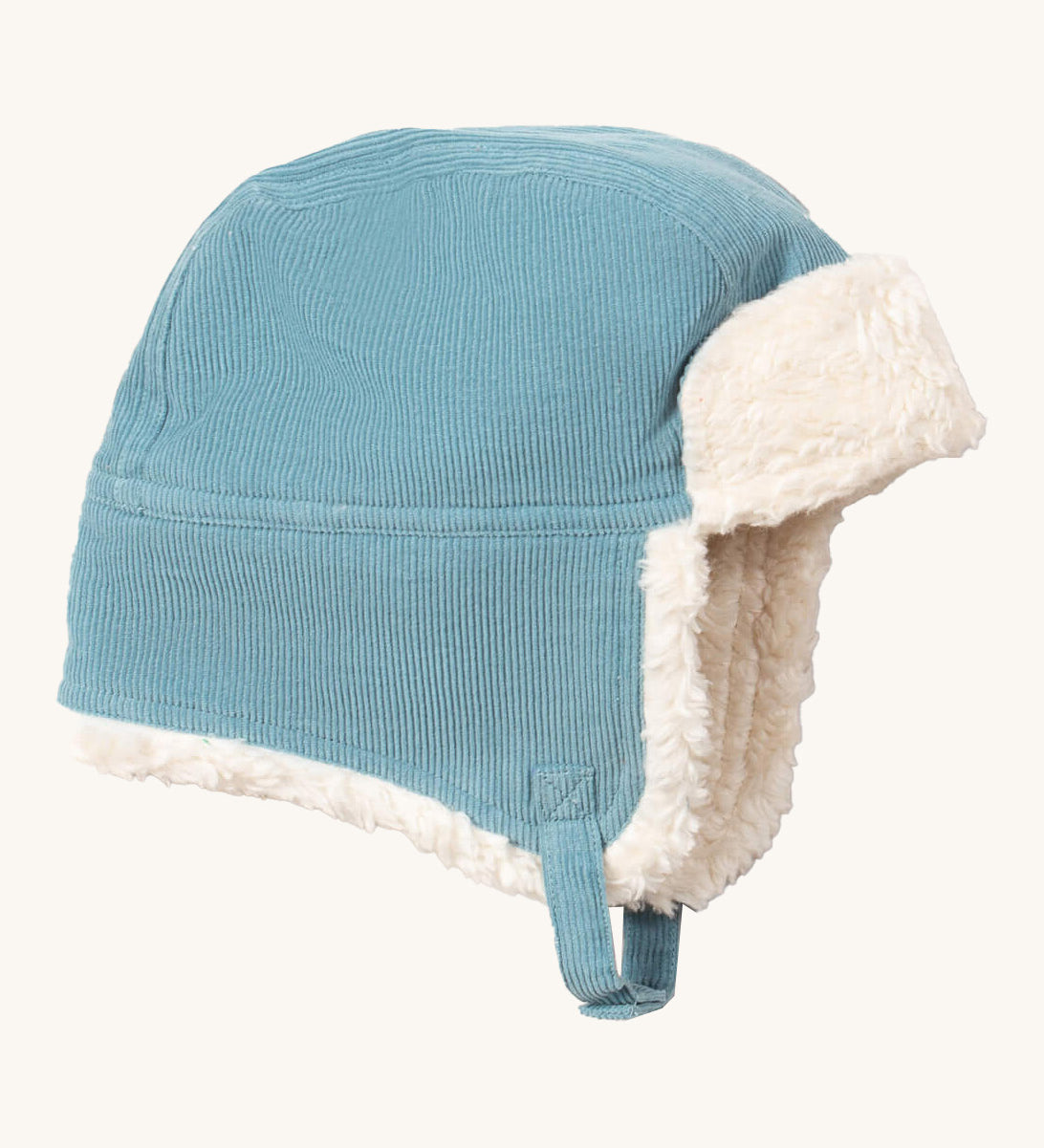 Little Green Radials sherpa fleece cosy hat in pale blue available at Babipur. A GOTS organic cotton blue hat in a corduroy style with turn up ear flaps and a white sherpa style fleece inner. Features a chin strap with popper fastener for a secure fit