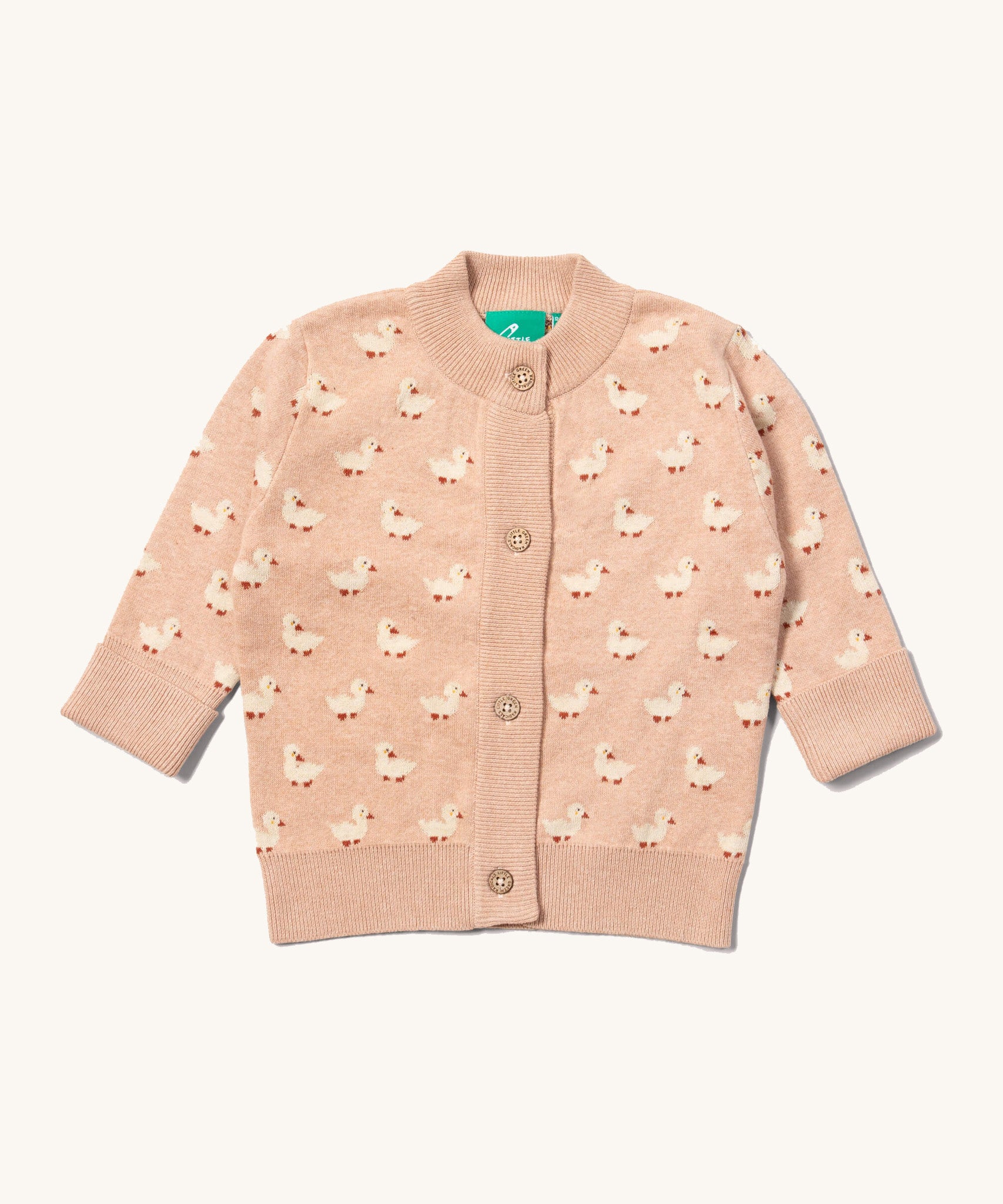 Little Green Radicals knitted cardigan in puddle ducks available at Babipur. A GOTS organic cotton cardigan in soft pink with cute white ducks. Features button fasteners for a secure fit