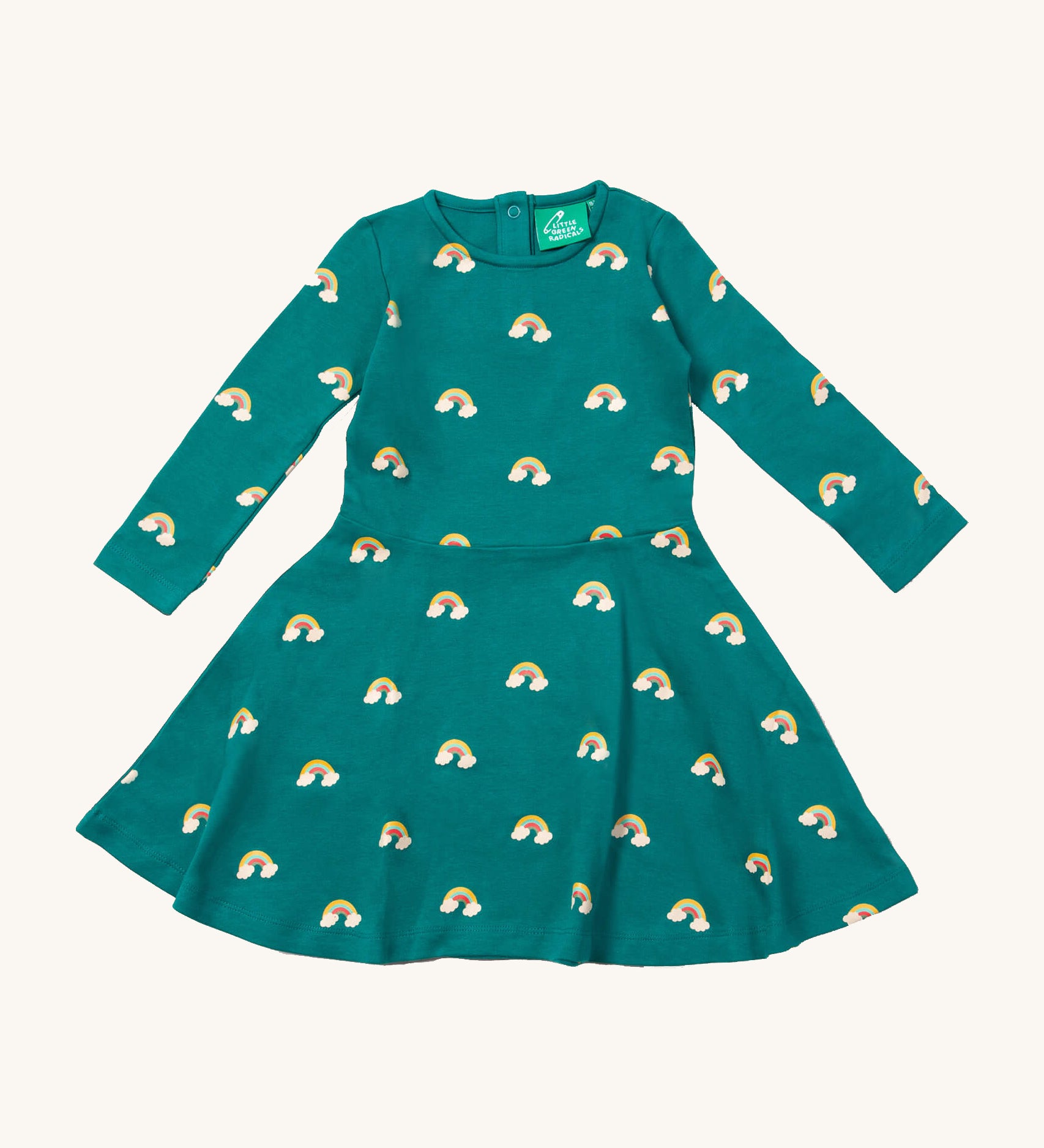 Little Green Radicals rainbow turquoise twirly dress available at Babipur. A GOTS organic cotton dress with long sleeves a popper fastener on the back. Features cute prints of rainbows on clouds.