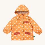 Little Green Radicals waterproof adventure coat in gold ducks available at Babipur. A yellow waterproof coat with cute white duck prints and red trim. Features a hood with a white sherpa fleece liner, a full length zip, a chest pocket and 2 side pockets. 