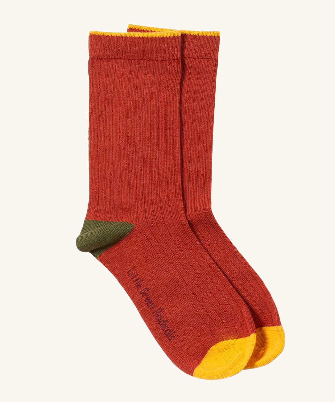 Little Green Radicals red block ankle socks from the golden leaves set available at Babipur. A soft ribbed GOTS organic cotton sock with green and yellow trim 