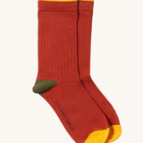 Little Green Radicals red block ankle socks from the golden leaves set available at Babipur. A soft ribbed GOTS organic cotton sock with green and yellow trim 