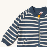 A close up of the Little Green Radicals reversible easy rider jacket in sleeping sheep. Showing the collar detail and zip detail which features a yellow toggle for easy opening and closing 