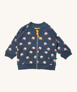 Little Green Radicals reversible easy rider jacket in sleeping sheep. A GOTS organic cotton bomber jacket style in navy with a full length zip, pouch pockets and cute prints of white sheep. 