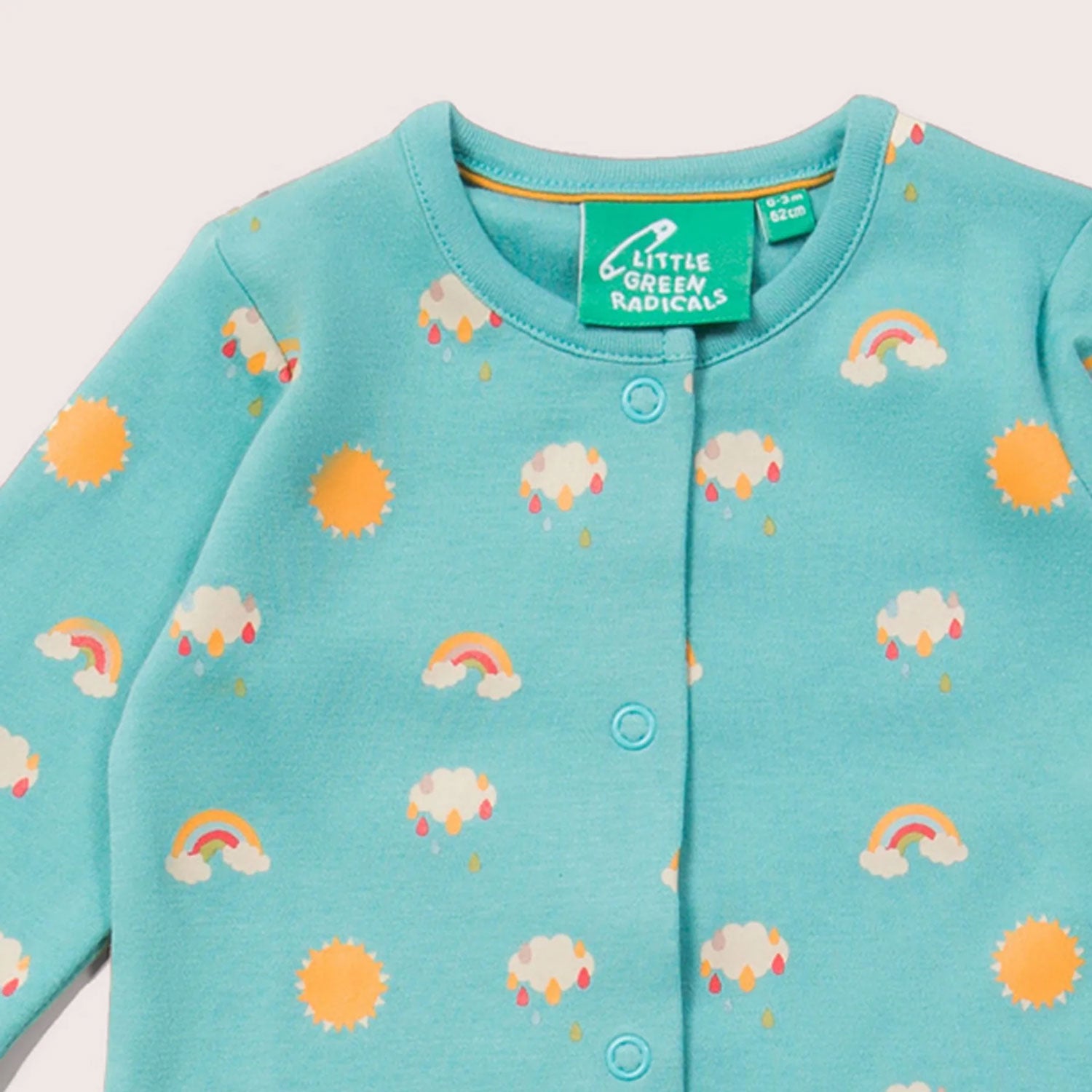 Close up of the print on the lgr sunny days baby grow