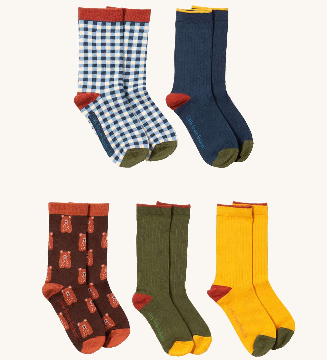 Little Green Radicals teddy bear ankle socks 5 pack available at Babipur. A GOTS organic cotton sock multipack includes a blue and white check, navy, yellow and green block ankle socks and a teddy bear ankle sock.