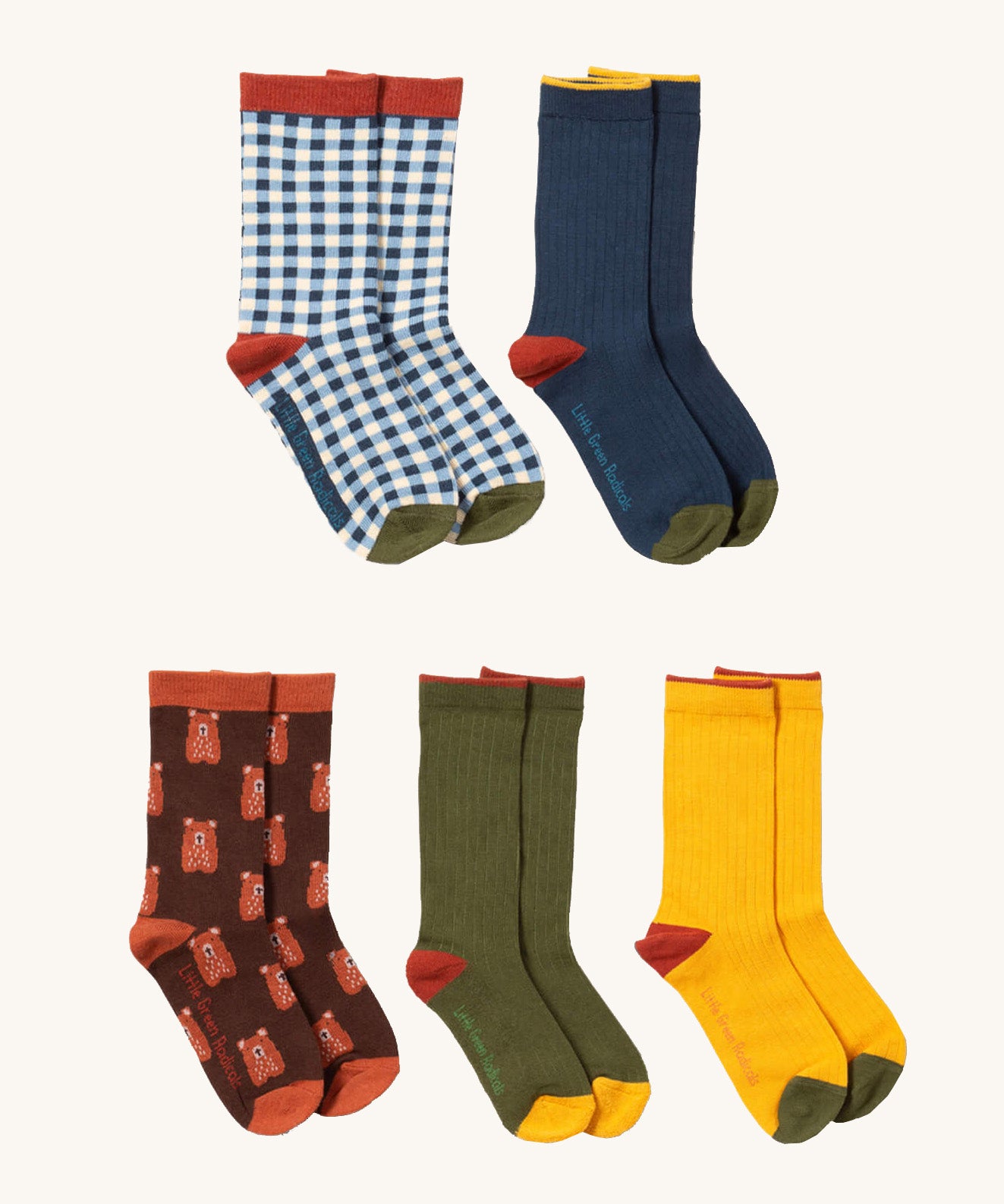 Little Green Radicals teddy bear ankle socks 5 pack available at Babipur. A GOTS organic cotton sock multipack includes a blue and white check, navy, yellow and green block ankle socks and a teddy bear ankle sock.