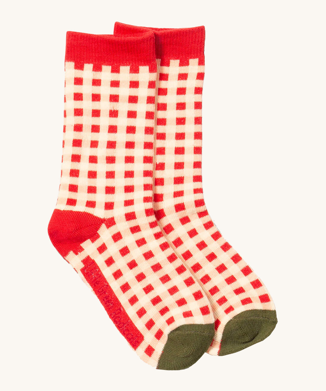Little Green Radicals red and white check ankle socks from the winter rabbit set available at Babipur. A GOTS organic cotton sock with a check design with red and green trim.