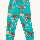 Little Green Radicals winter rabbit pyjama bottom. A GOTS organic cotton bottom in turquoise with a elasticated waistband and matching turquoise cuff trim with prints of brown rabbits in pink flowers