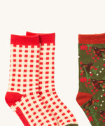 A close up of the red and white check Little Green Radicals ankle socks showing check design with red trim detail on soft organic cotton fabric