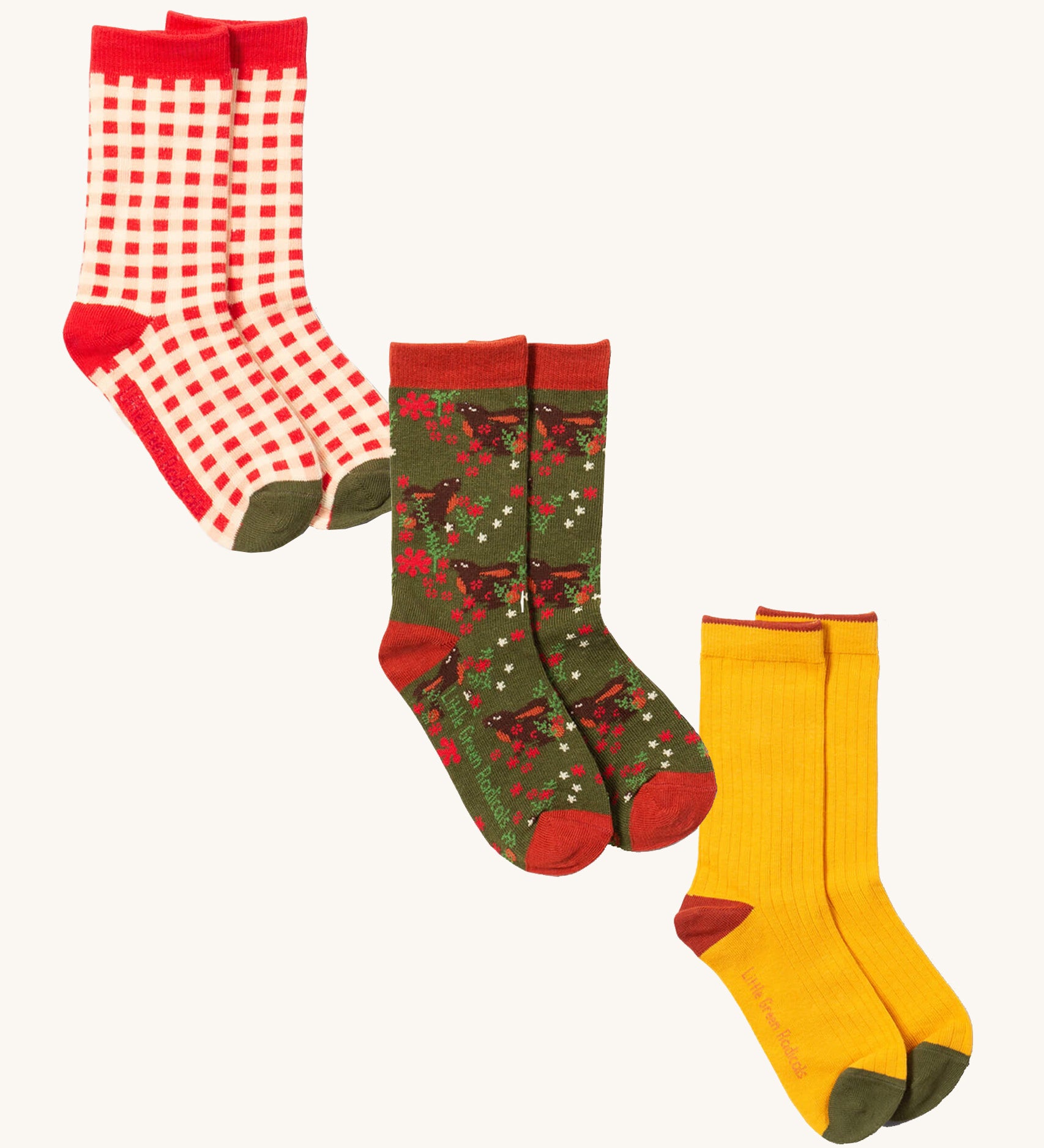 Little Green Radicals winter rabbit ankle socks  3 pack available at Babipur. A GOTS organic cotton sock multipack includes a red and white check, winter rabbit and a yellow block sock.
