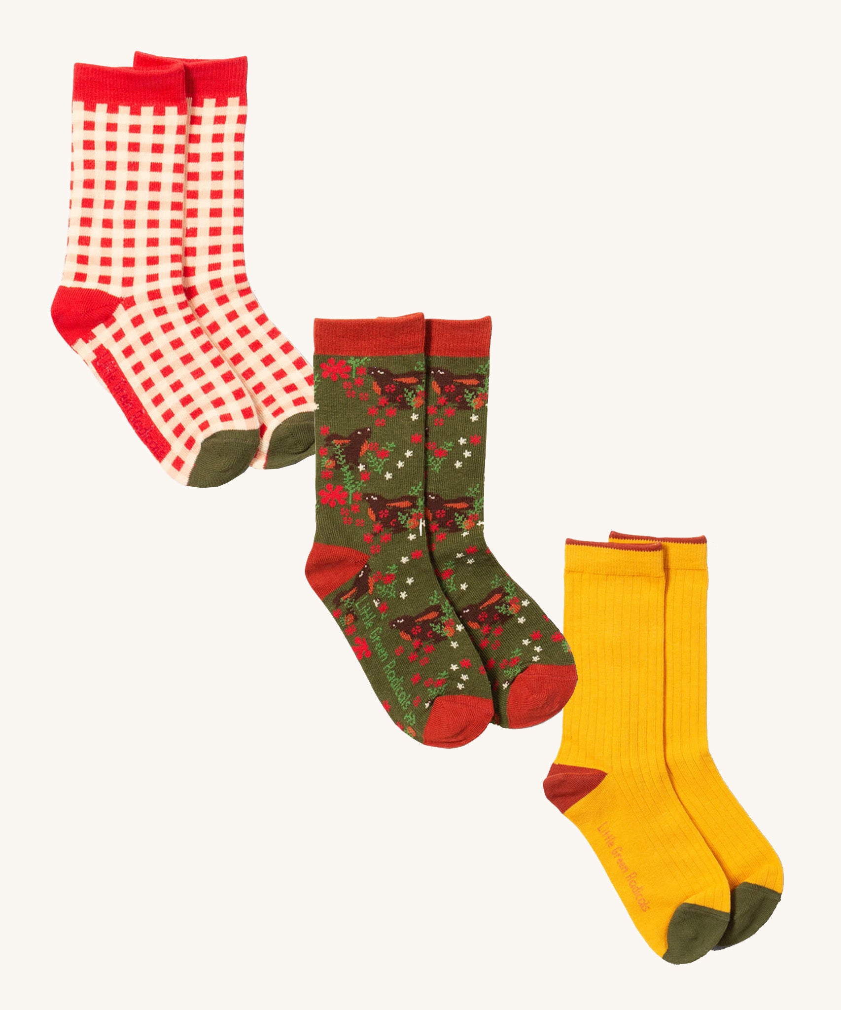 Little Green Radicals winter rabbit ankle socks  3 pack available at Babipur. A GOTS organic cotton sock multipack includes a red and white check, winter rabbit and a yellow block sock.

