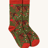 Little Green Radicals winter rabbit ankle socks available at Babipur. A dark green GOTS organic cotton sock with rabbits in flowers and red trim. 