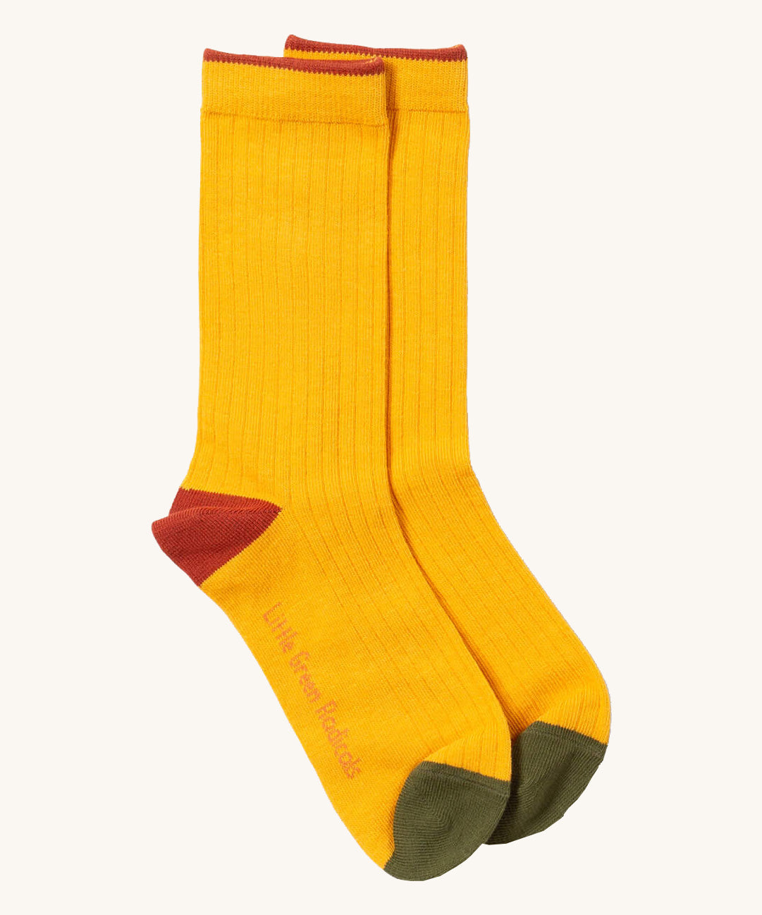 Little Green Radicals yellow block ankle socks from the winter rabbit set available at Babipur. A soft ribbed GOTS organic cotton sock with green and red trim.