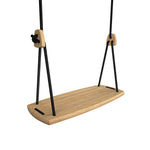 Close up of the Lillagunga eco-friendly black oak wood rope swing on a white background