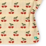 Material of the Little Green Radicals little cherries organic cotton baby towel poncho.