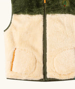 Close up of the Little Green Radicals cosy cream and chive green recycled zip-up fleece gilet.