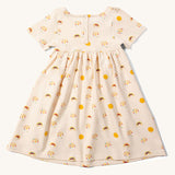 View of the back of the Little Green Radicals Adaptive Sunshine & Rainbows Easy Peasy Dress pictured on a plain background