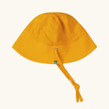 Little Green Radicals All Weather Organic Cotton Reversible Sunhat shown on the yellow gold colored side. 